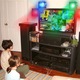 Two Lansing, MI children watch an ADHDTV promo for the entire prime-time network lineup.